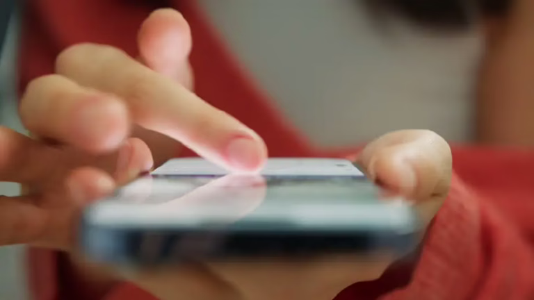 mobile-phone-hands-scrolling-social-feed-promo-content
