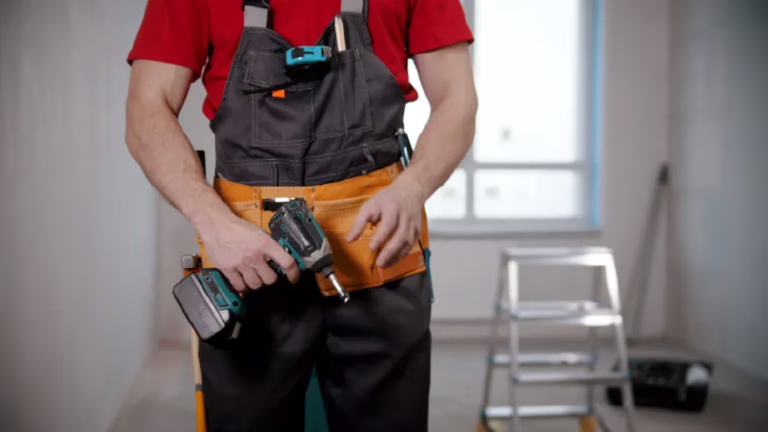 worker-showing-contractor-tool-belt